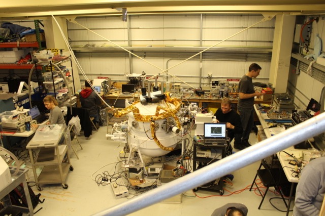 Working on the STO-2 instrument inside the hangar at LDB