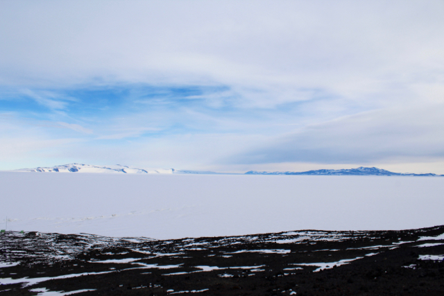 A view of White Island (left) and Black Island (right) on the drive between McMurdo Station and Scott Base en route to the Pressure Ridge Tour
