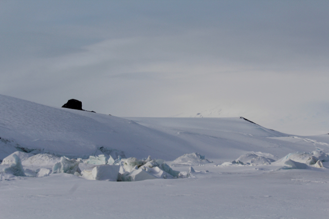 A view of Castle Rock taken from the pressure ridges between the Ross Sea Ice and the Ross Permanent Ice Shelf