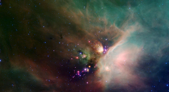 slide 4 - Young Stars in Their Baby Blanket of Dust
