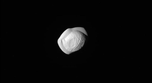 This raw, unprocessed image of Saturn's moon Pan was taken on March 7, 2017 by NASA's Cassini spacecraft.