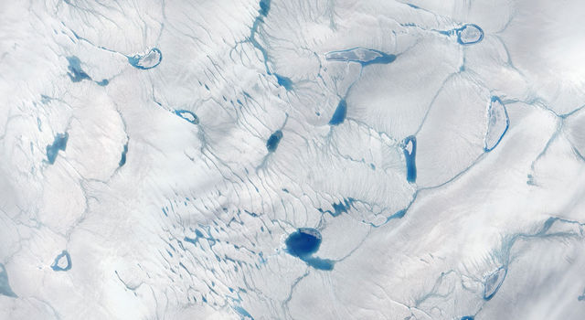 slide 2 - Pools of meltwater in southwestern Greenland's ice sheet