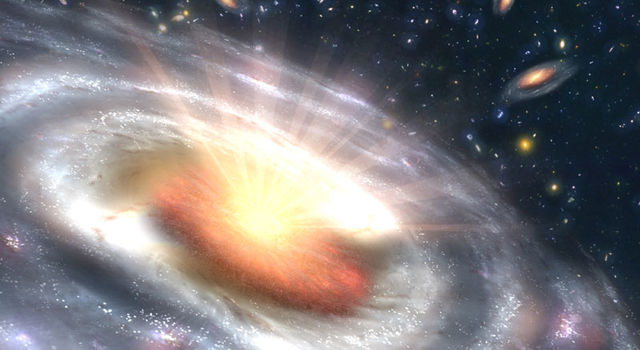 A growing black hole, called a quasar, can be seen at the center of a faraway galaxy in this artist's concept.