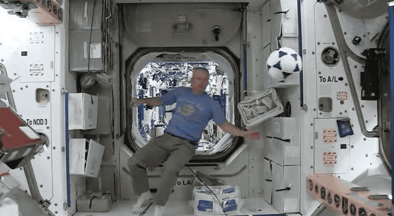 Astronauts play soccer on the International Space Station.