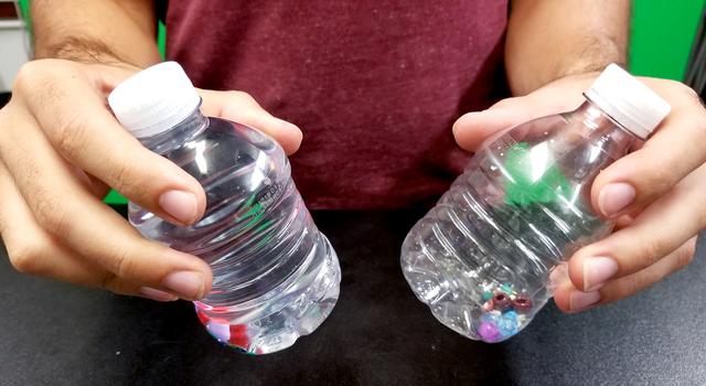 comparing the water bottle filled with water and the one without water