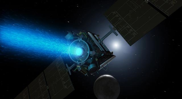 A glowing blue stream of ionized hydrazene flows out of the back of the Dawn spacecraft, propelling it toward a bright object in the distance ahead.