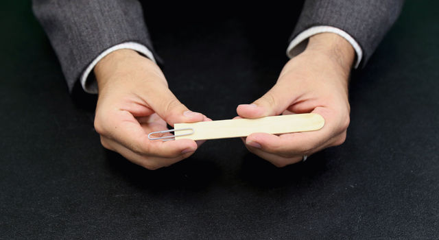 Attaching paper clip to popsicle stick