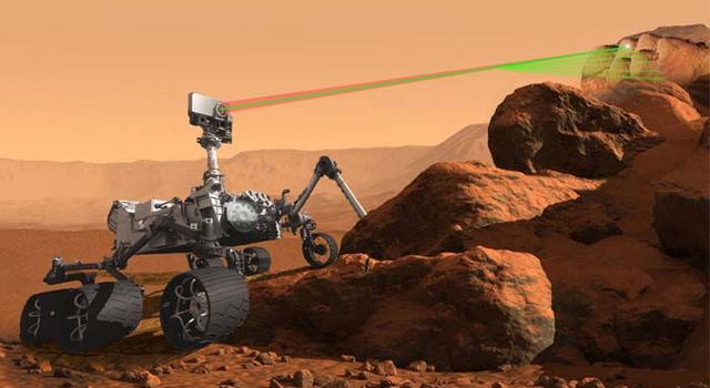 Illustration of a Mars rover using its laser to study the chemical composition of rocks on Mars.