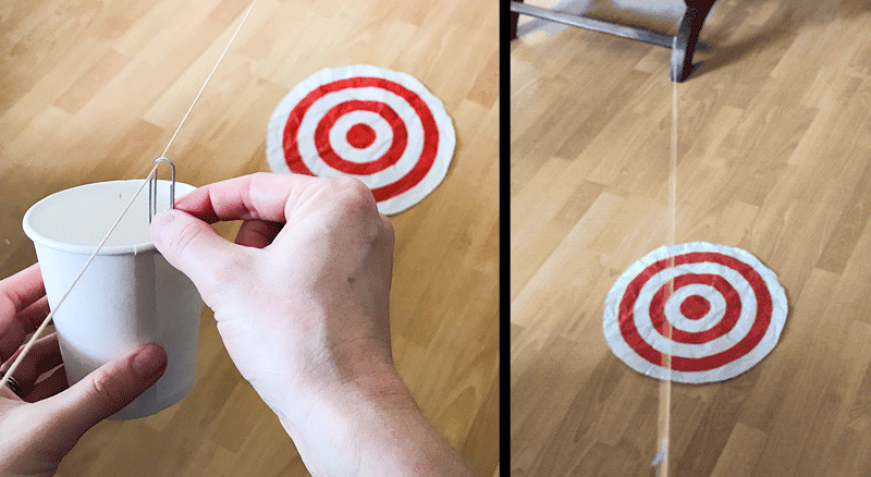 Side-by-side images showing a person attaching a paper cup and paper clip to a sloping line, then the paper cup moving down the line