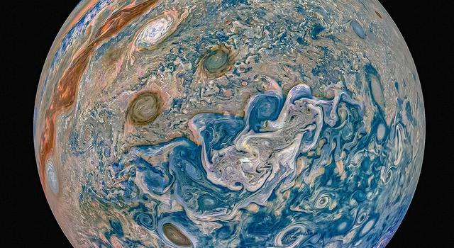 Colorful view of Jupiter's churning atmosphere from its north pole