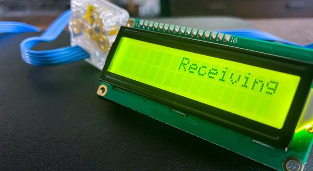 An indicator device reads "receiving"