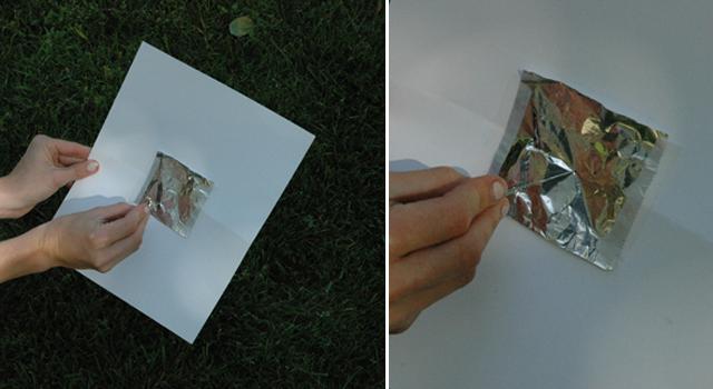 Step 3: Use your pin or paper clip to poke a small hole in the aluminum foil.