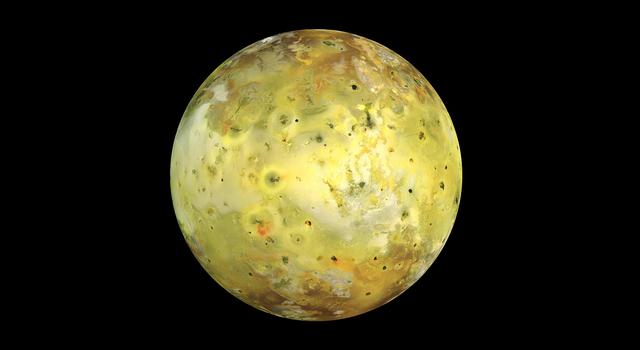 Splotches of orange, yellow, green, and white cover the surface of Io, which looks like a spherical cheese pizza.