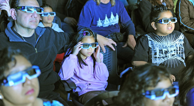 People watching a 3D movie